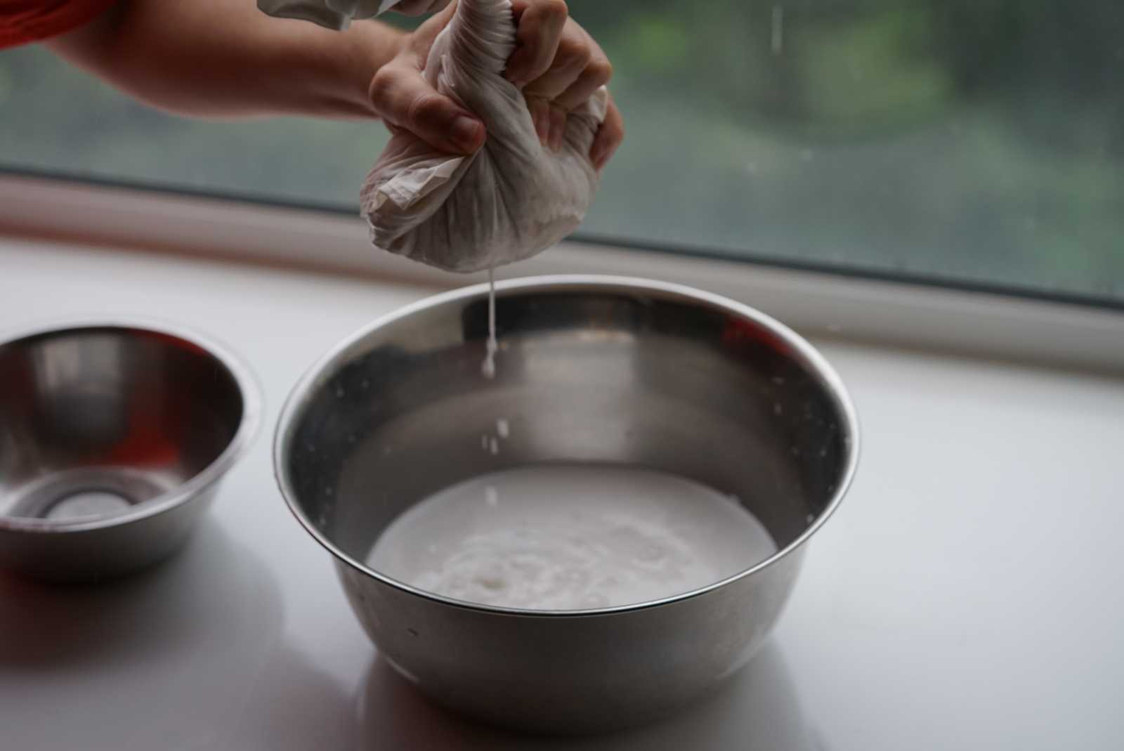 Squeezing coconut milk