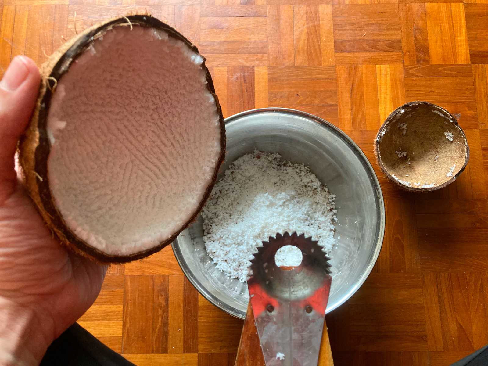 Grating coconut meat